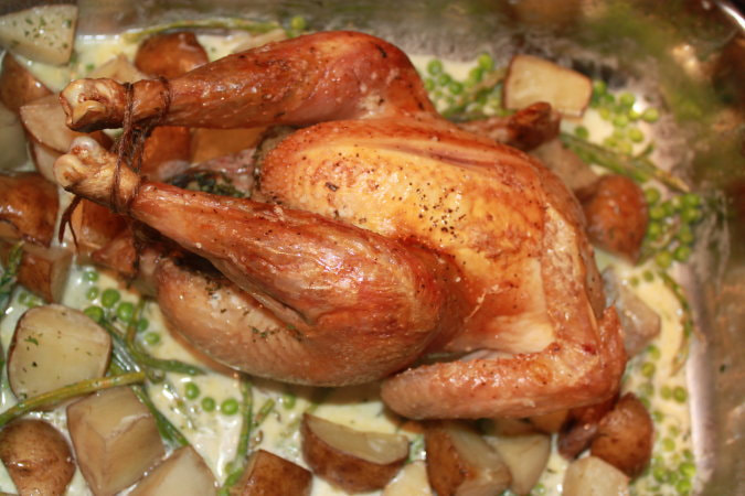 Pasture raised chicken roasted w tarragon sauce and veggies.
